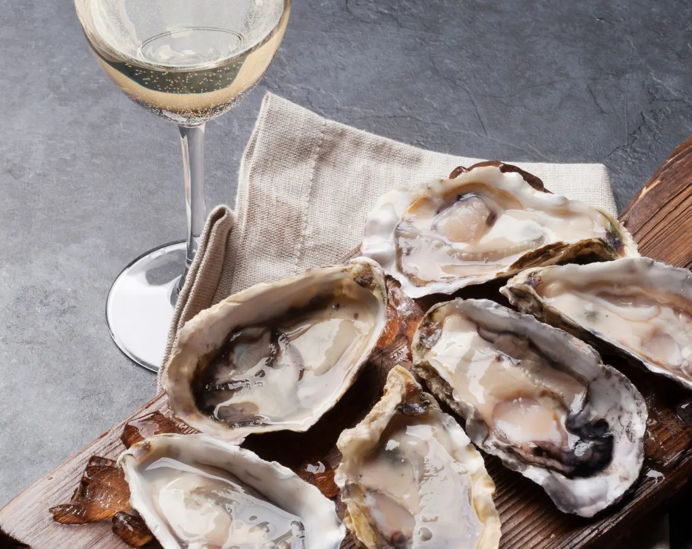 Oysters on ice with a glass of champagne