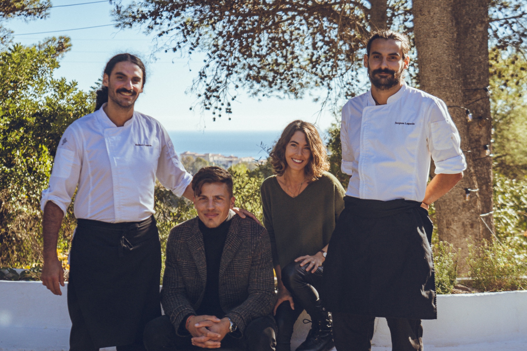 The Cascada team — Mathieu Lagarde, Max Marion Renard, and Jacques Lagarde with a colleague — on the terrace above Marbella